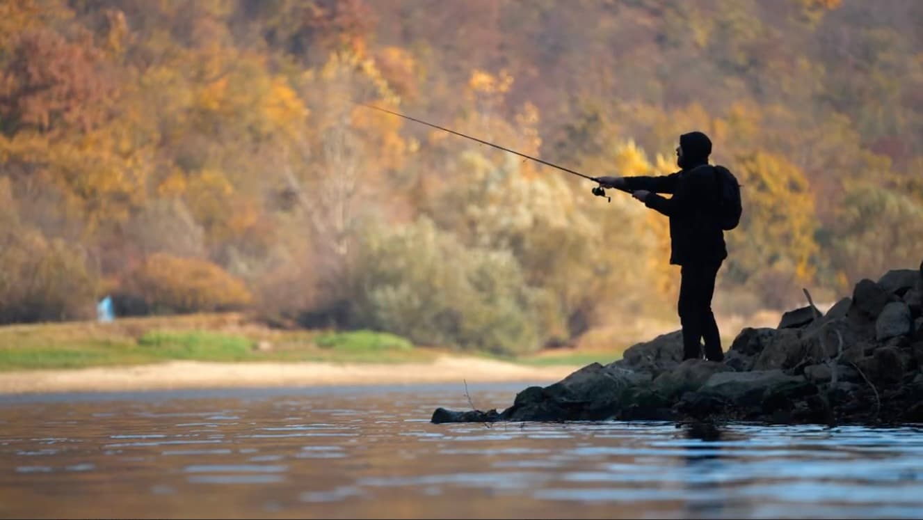Photo of a man fishing