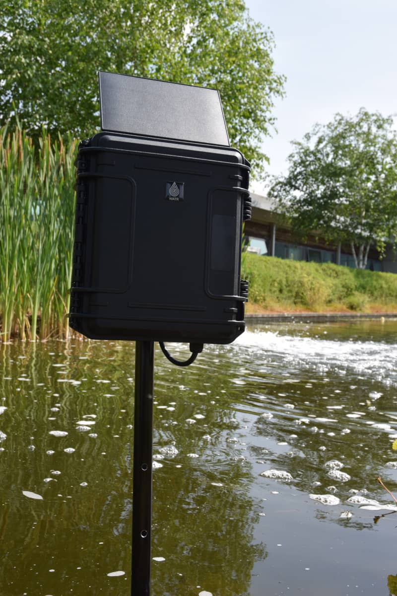 Photo of the WATR Depth unit placed in a river